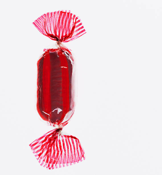 close up of wrapped hard candy - candy stok fotoğraflar ve resimler