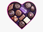 Close up of chocolates in heart-shape box