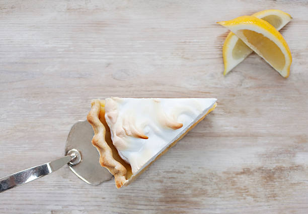 Slice of lemon meringue pie  meringue stock pictures, royalty-free photos & images