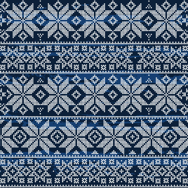 istock Abstract winter seamless pattern on a blue textured background. Geometric decor of white dots. 1033334112