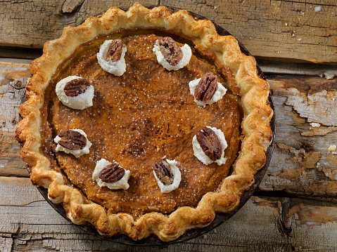 Pumpkin Pie with Candied Pecans and Whip Cream
