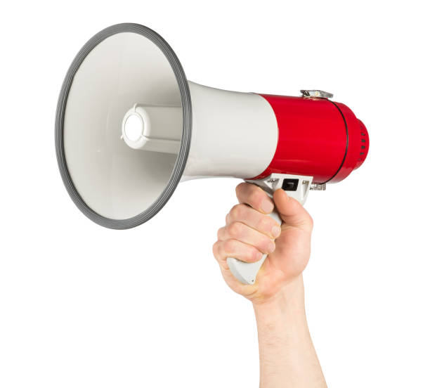 istock hand with red white bullhorn megaphone 1033355204