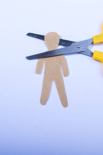 istock Paper man shape in hand in the view 1033357766
