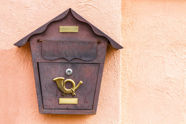 istock A beautiful mailbox hangs waiting for newspapers, parcels and letters. 1033358206