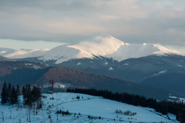 Evening winter cloudy day mountain ridge
