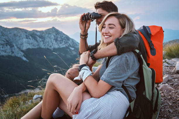 istock young couple enjoying hiking together 1033364526