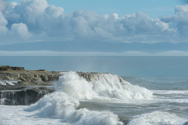 istock Ocean Waves Crashing on Coastal Rocks 1033375276