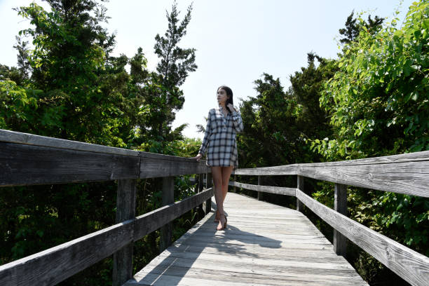 istock Beautiful young woman outside 1033376520
