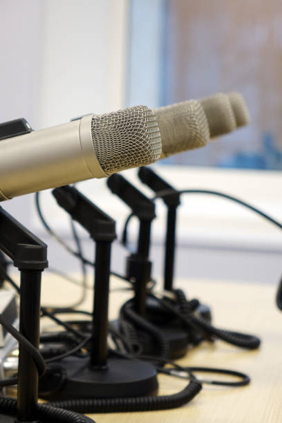 istock Microphones in the Studio on a light background. 1033388602