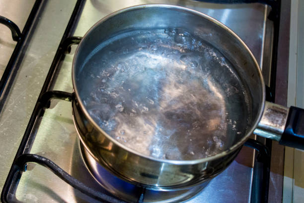 istock Boiling water in a steel casserole pot 1033391578