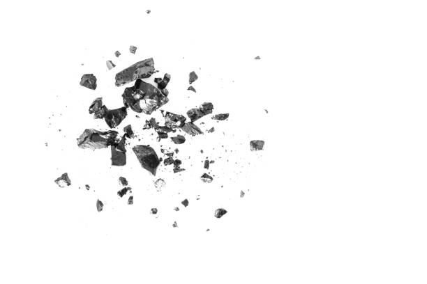 istock Pile of black coal bars isolated on white background 1033392286