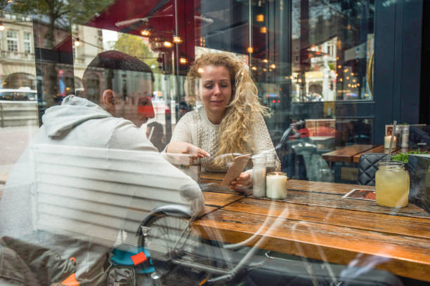 istock Young beautiful couple choosing food for dinner in restaurant. 1033407680