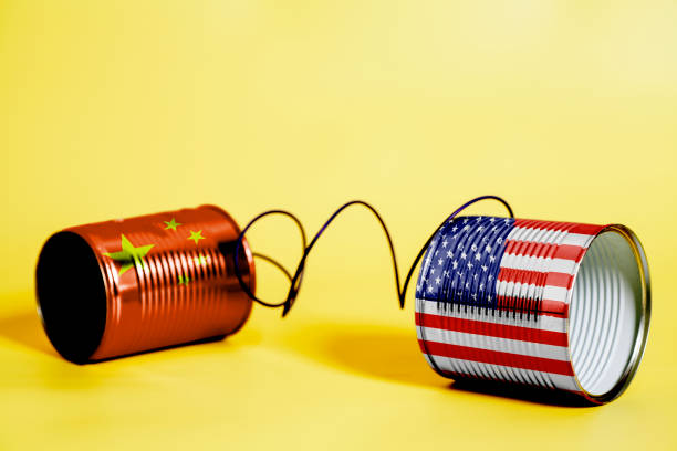 istock tin can phone with USA and China Flags. communication concept 1033442566