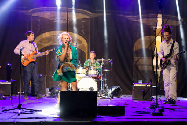 istock Rock group playing on the concert 1033446302