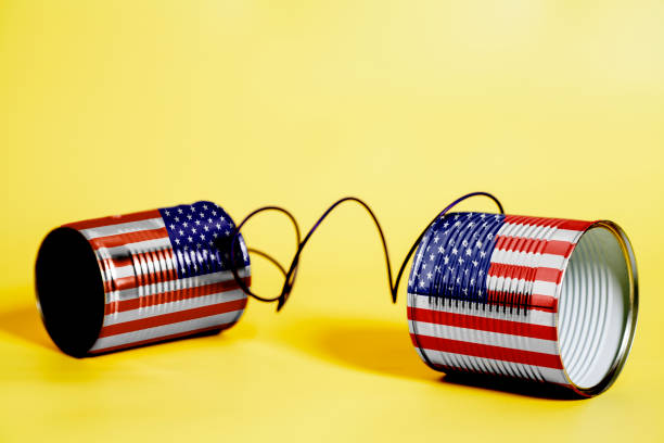 istock tin can phone with USA Flag. communication concept 1033447010