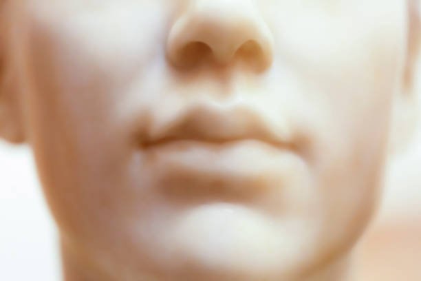 Closeup old marble statue of angel, background with copy space