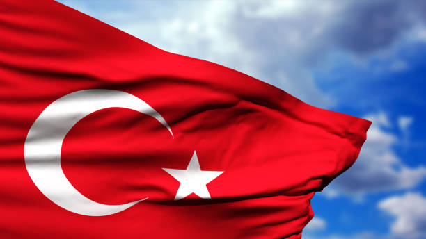 istock Turkish Flag Whips On Cloudy SkyTurkish Flag Whips On Cloudy Sky 1033450148