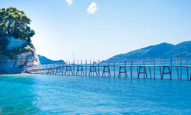 Photo of Wooden bridge on the small island