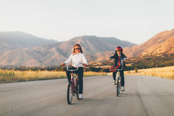 istock Young Business Girl Racing on Bicycle 1033483162
