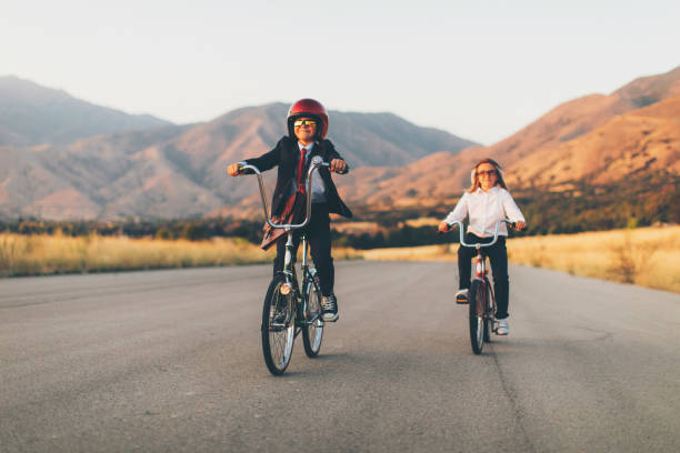 istock Young Business Boy Racing on Bicycle 1033483244