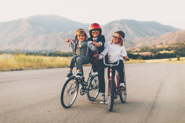 young business biking team - group of people 1980s style image created 1980s exercising imagens e fotografias de stock