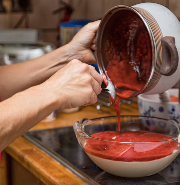 istock Female hands prepare a dessert 1033492052