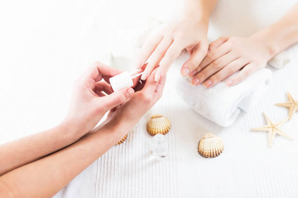 istock Woman hands on manicure 1033500516