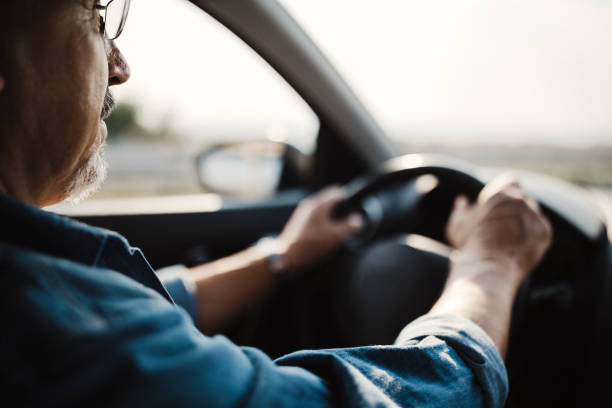 istock Elderly man in a car 1033510588