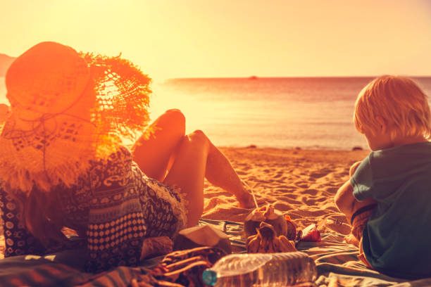 Family picnic on tropical beach
