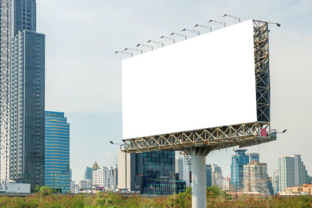 istock billboard blank on road in city for advertising background 1033520230