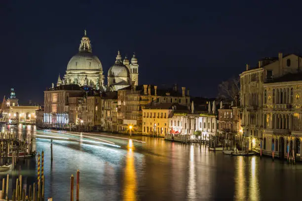 Long exposure of boats traveling on the Grand Canal. Venice, Italy.