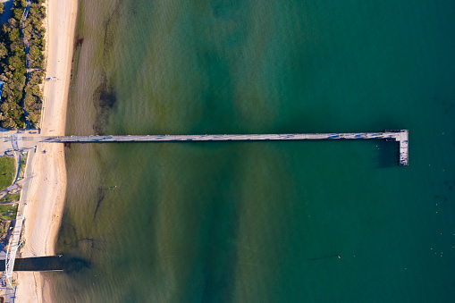 Aerial photograph of the Frankston Pier in the Mornington Peninsula captured on a warm sunny spring day.