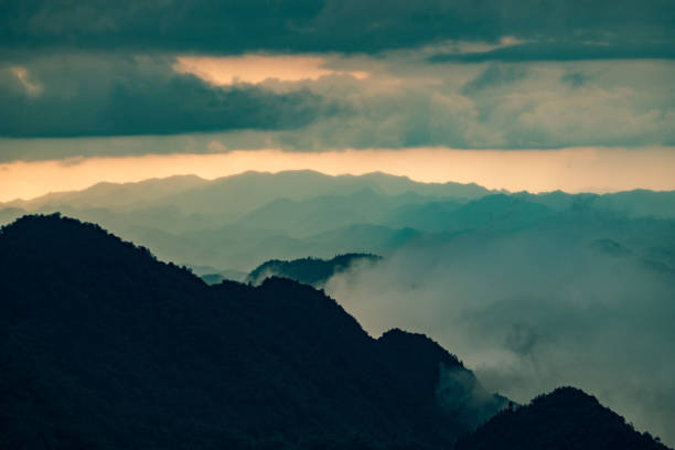istock Mountain landscape with fog 1033583654