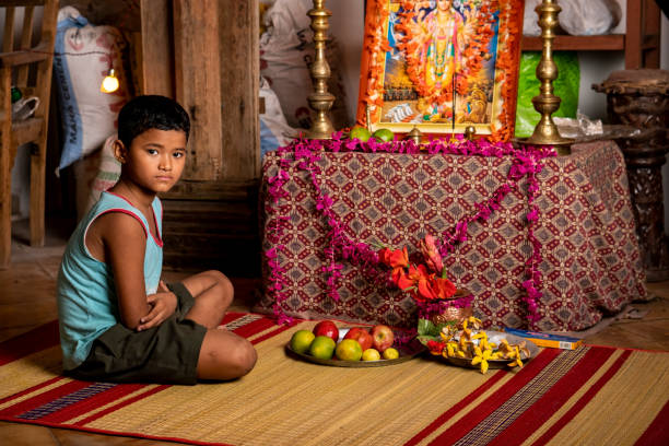 istock A Nepali boy at an altar (Staged) 1033596360