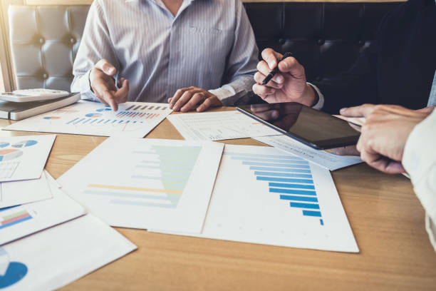 istock Meeting and greeting, Business team colleagues discussing working analysis with financial data and marketing growth report graph in team, Meeting Talking Brainstorming Communication Concept 1033598846