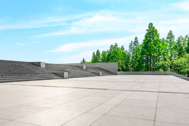 istock Empty city square floor and green woods scenery 1033633900