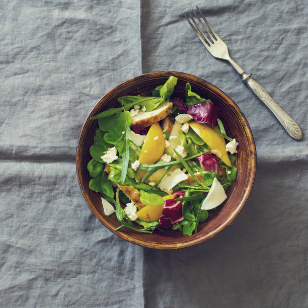 istock Pears, goat cheese and greens salad 1033644048