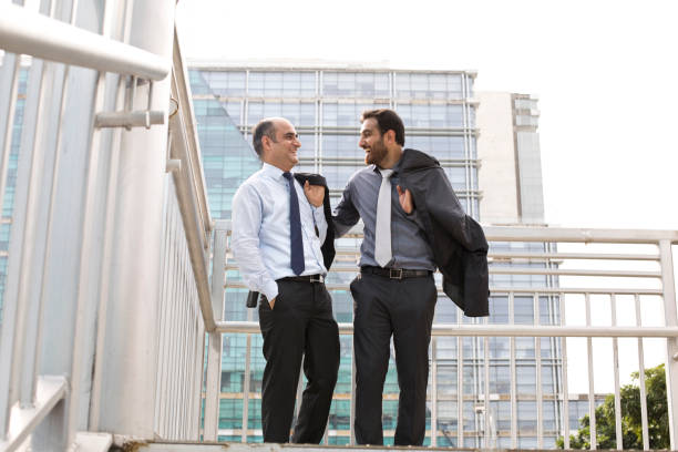 istock Two businessmen discussing in city 1033648928