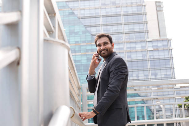 istock Businessman talking on mobile phone 1033657814
