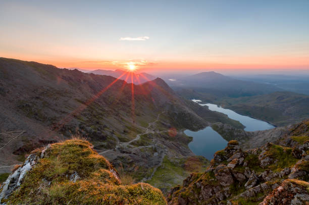 Snowdon Sunrise An early morning summer sunrise near the summit of mount Snowdon in the snowdonia national park, Wales. mount snowdon photos stock pictures, royalty-free photos & images