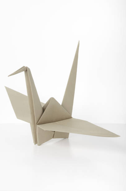istock Brown Tan Origami Crane 1033666312