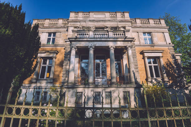 April, 9th, 2017 - Potsdam, Brandenburg, Germany. Family mansion building . Reach german villa or victorian manor in Potsdam by spring sunny day.