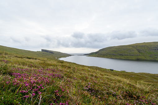 View of lake Sorvagsvatn from the hiking trail path. Island of Vagar, Faroe Islands