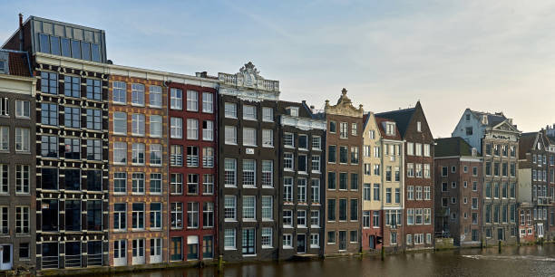 istock Canal houses in Amsterdam, Netherlands 1033685746