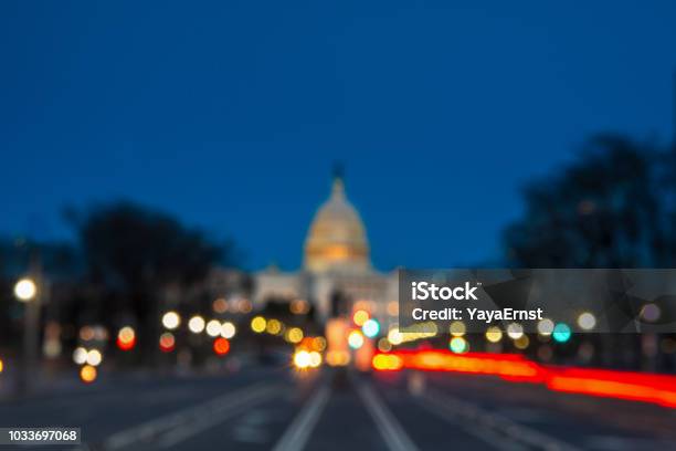 The United States Capitol With Blurred Background After Sunset Stock Photo - Download Image Now