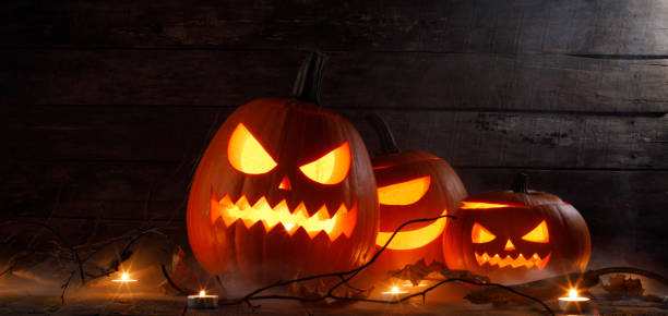 istock Halloween pumpkin and candles 1033716486