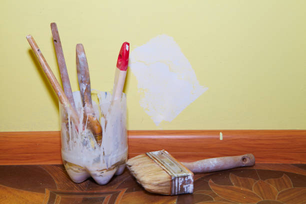istock Plastering tools in the yellow room 1033719572