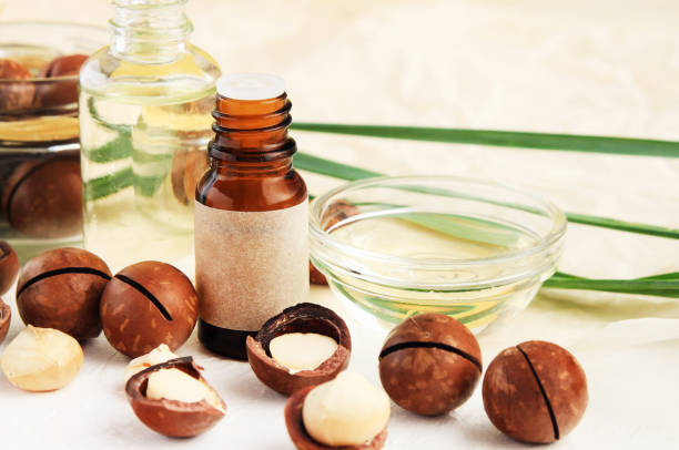 istock Bottles of oil, handmade label, essential oils, macadamia nuts. 1033723850