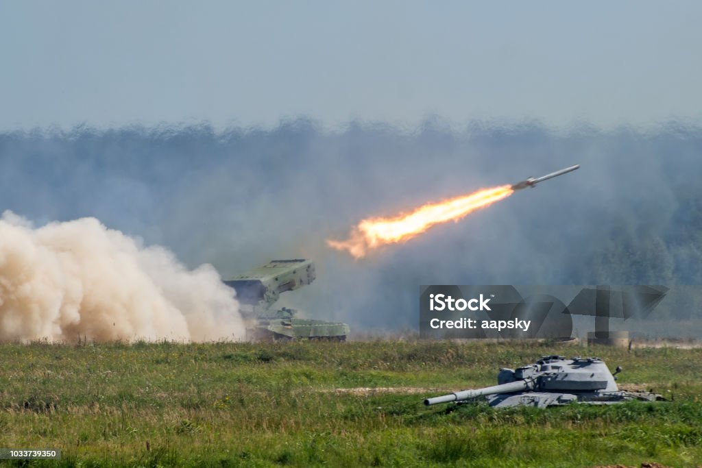 Launching military rockets in the woodlands, war shot defense attack. Launching military rockets in the woodlands, war shot defense attack Missile Stock Photo