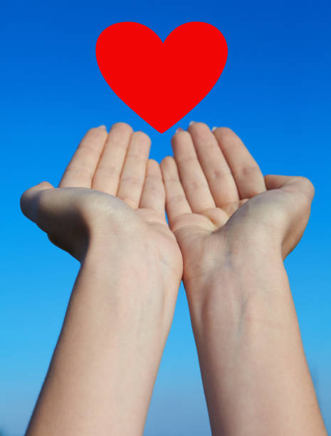 istock Young woman launches a heart 1033742972